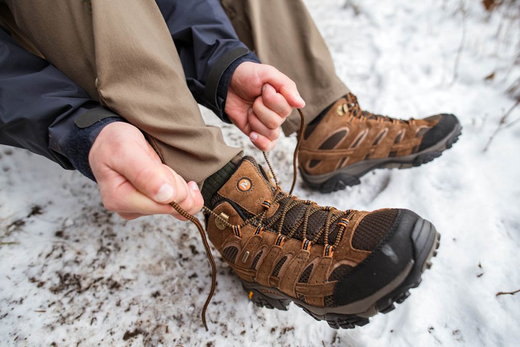 Merrell Men’s Moab 2 Mid Waterproof Hiking Boot on snow